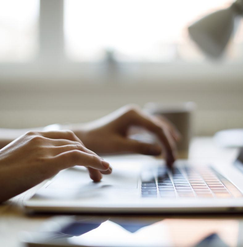 Woman using her laptop for working from home